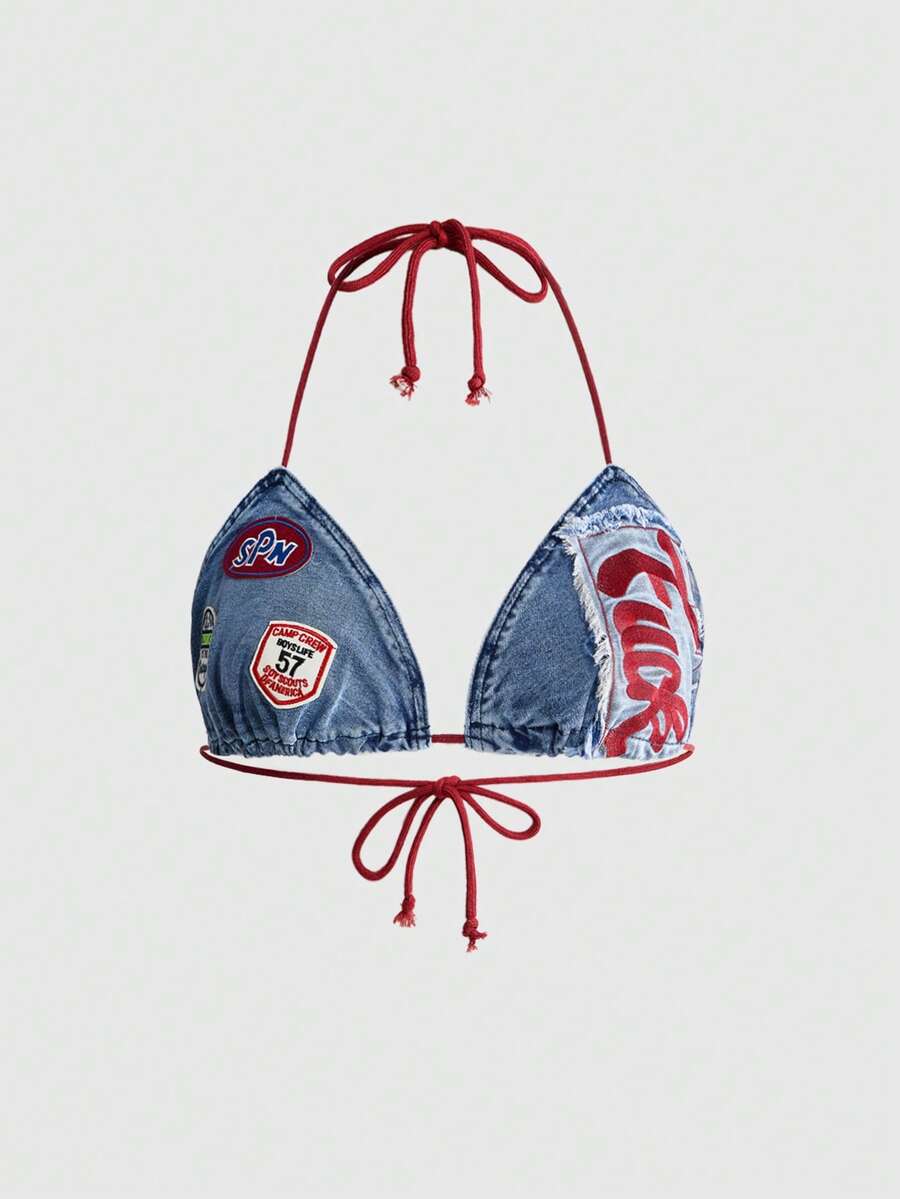 Blue denim sleeveless halter crop top for women featuring front knot tie detail and slim fit design.