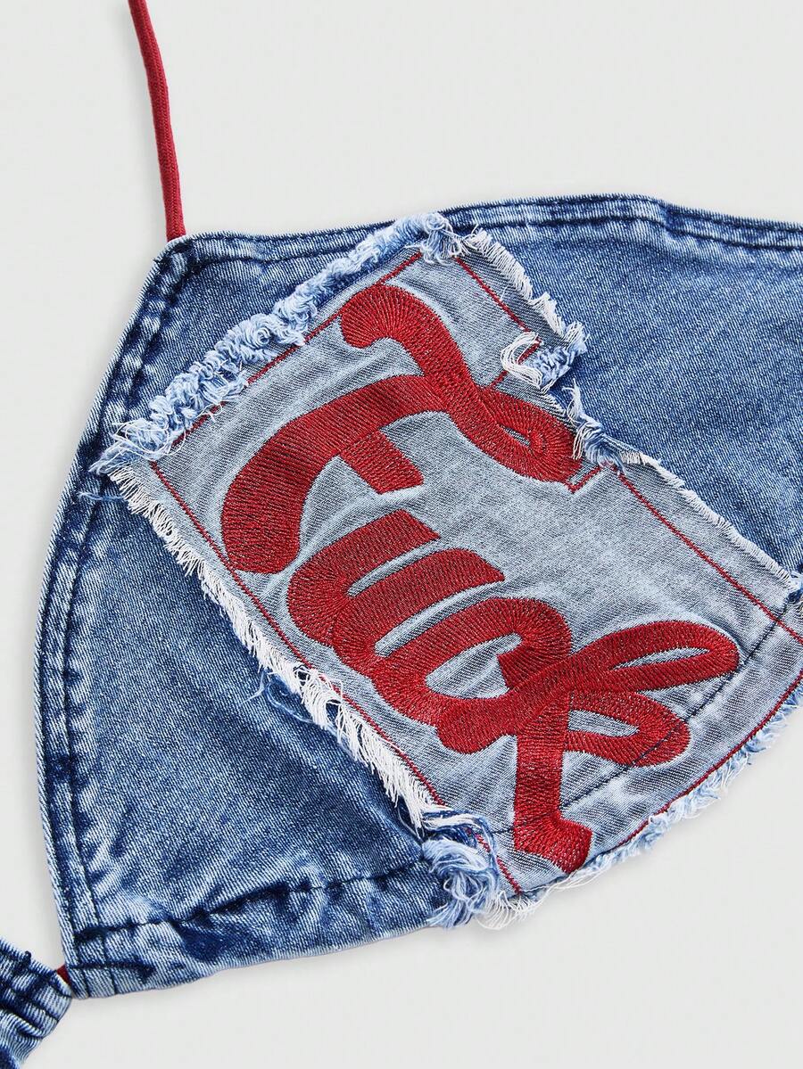 Blue denim sleeveless halter crop top for women featuring front knot tie detail and slim fit design.