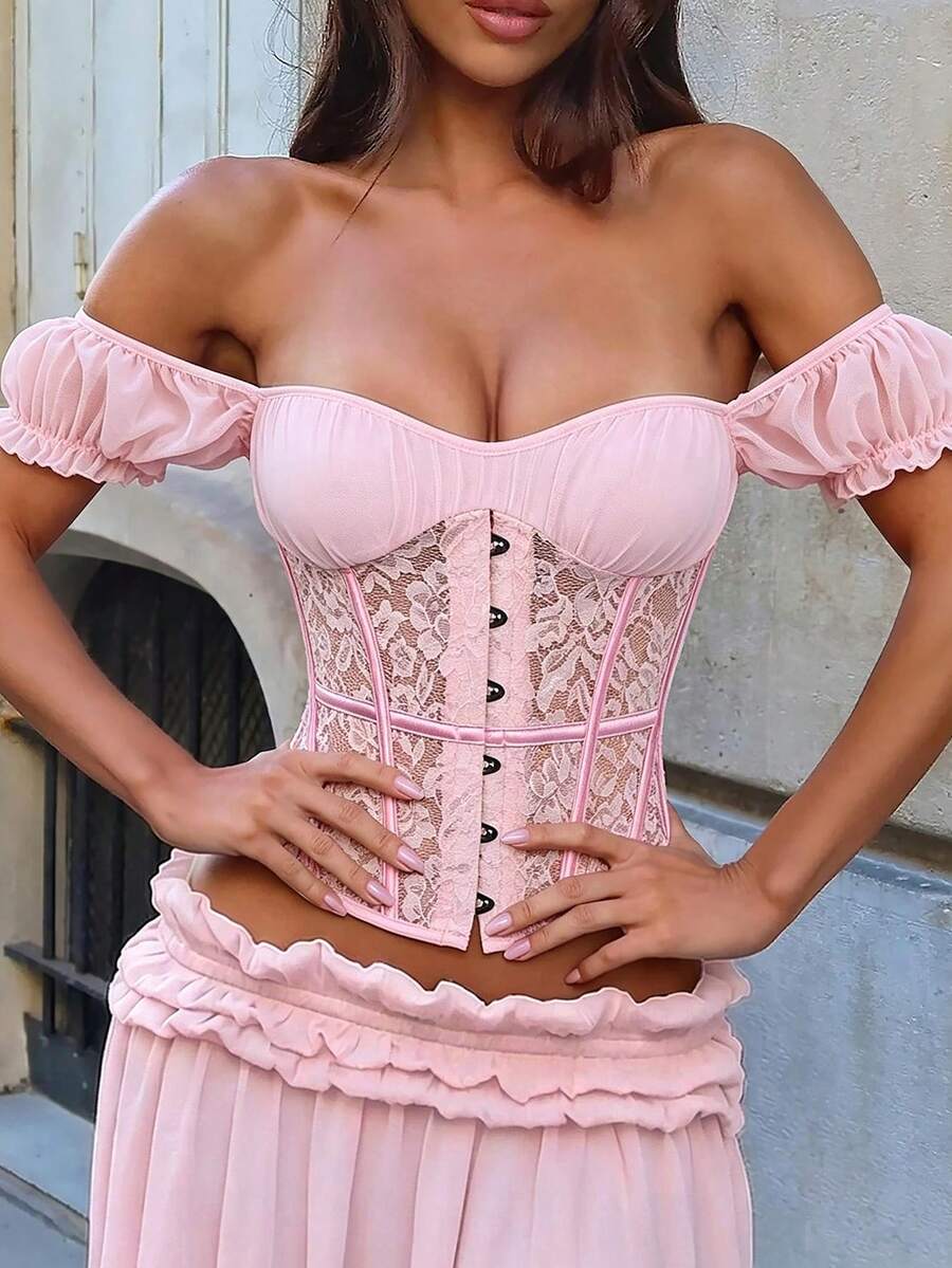 White women’s lace corset crop top with square neckline, boned detail, front button closure, and slim fit silhouette.