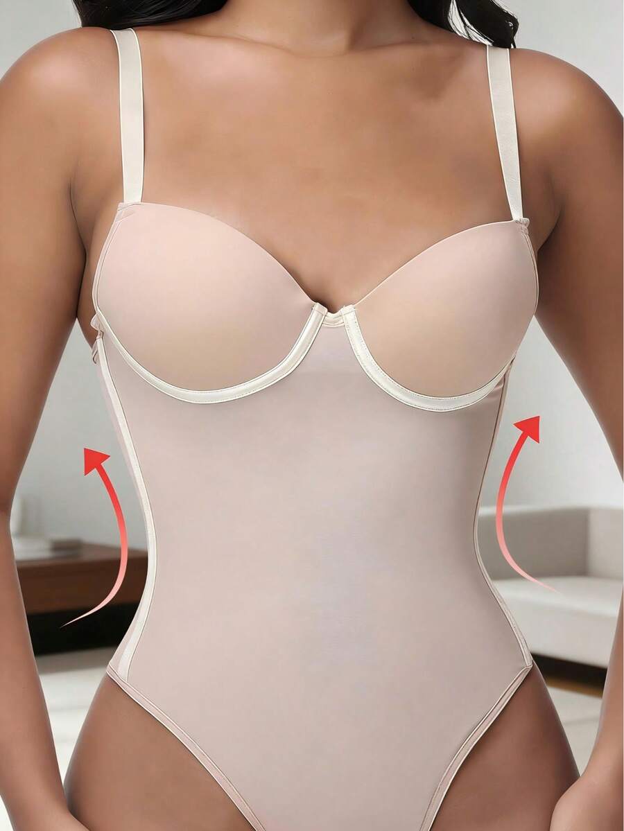 Black shapewear bodysuit for women featuring a built-in push-up bra, back tie, zipper closure, and Bermuda shorts length.