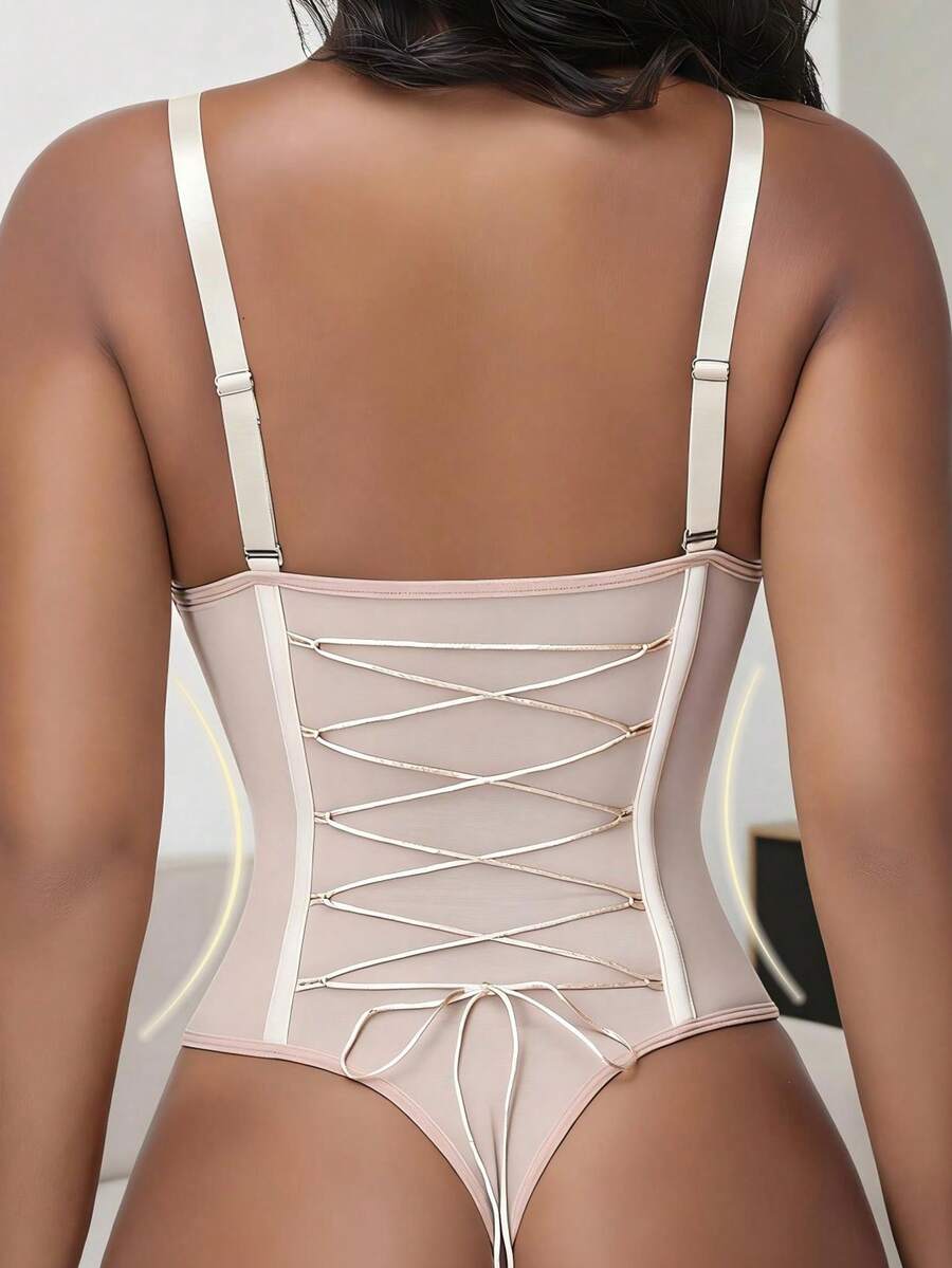 Black shapewear bodysuit for women featuring a built-in push-up bra, back tie, zipper closure, and Bermuda shorts length.