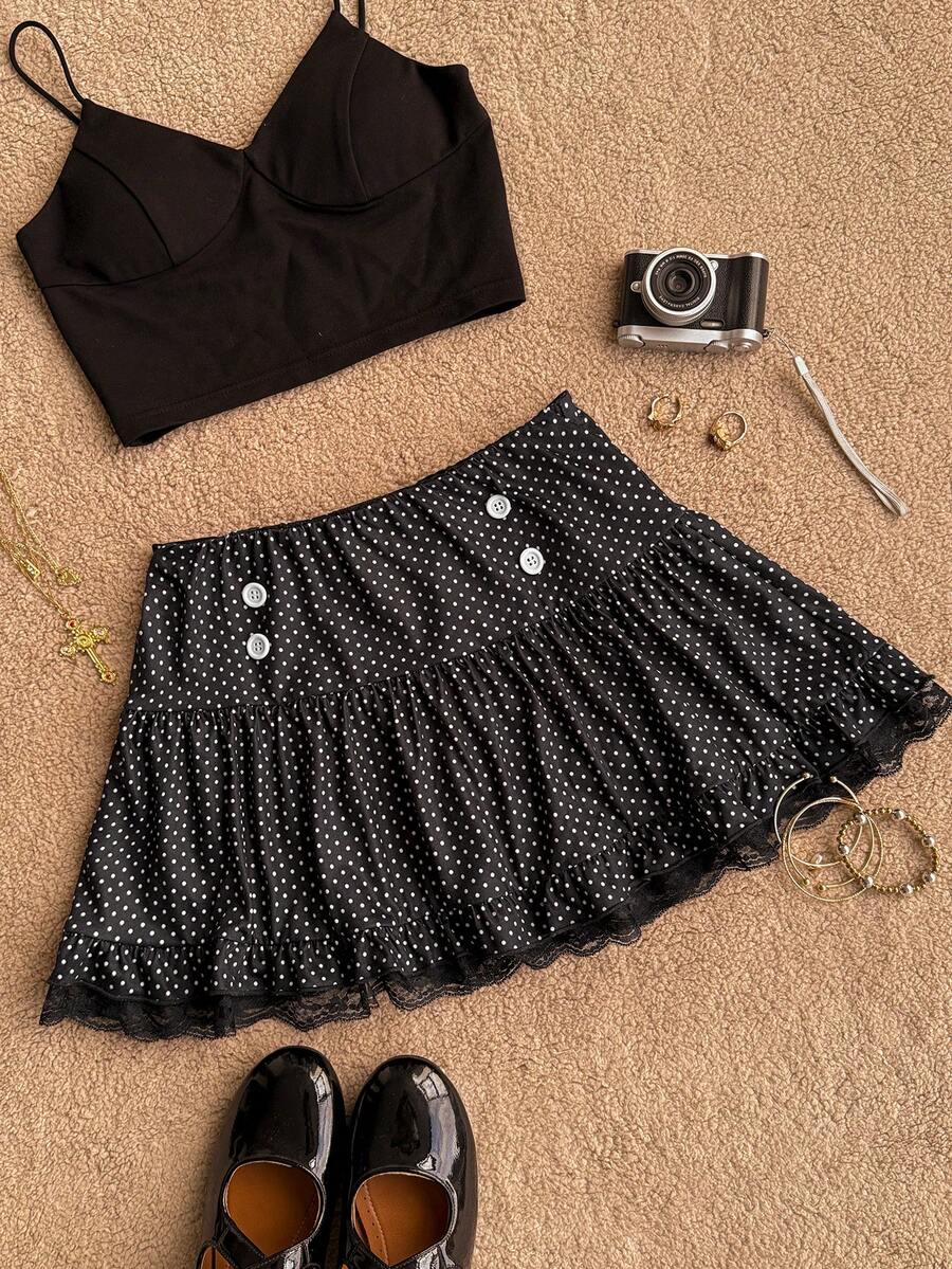 Women's plain black ultra low waist bodycon mini skirt with frill detailing in knitted stretch fabric.