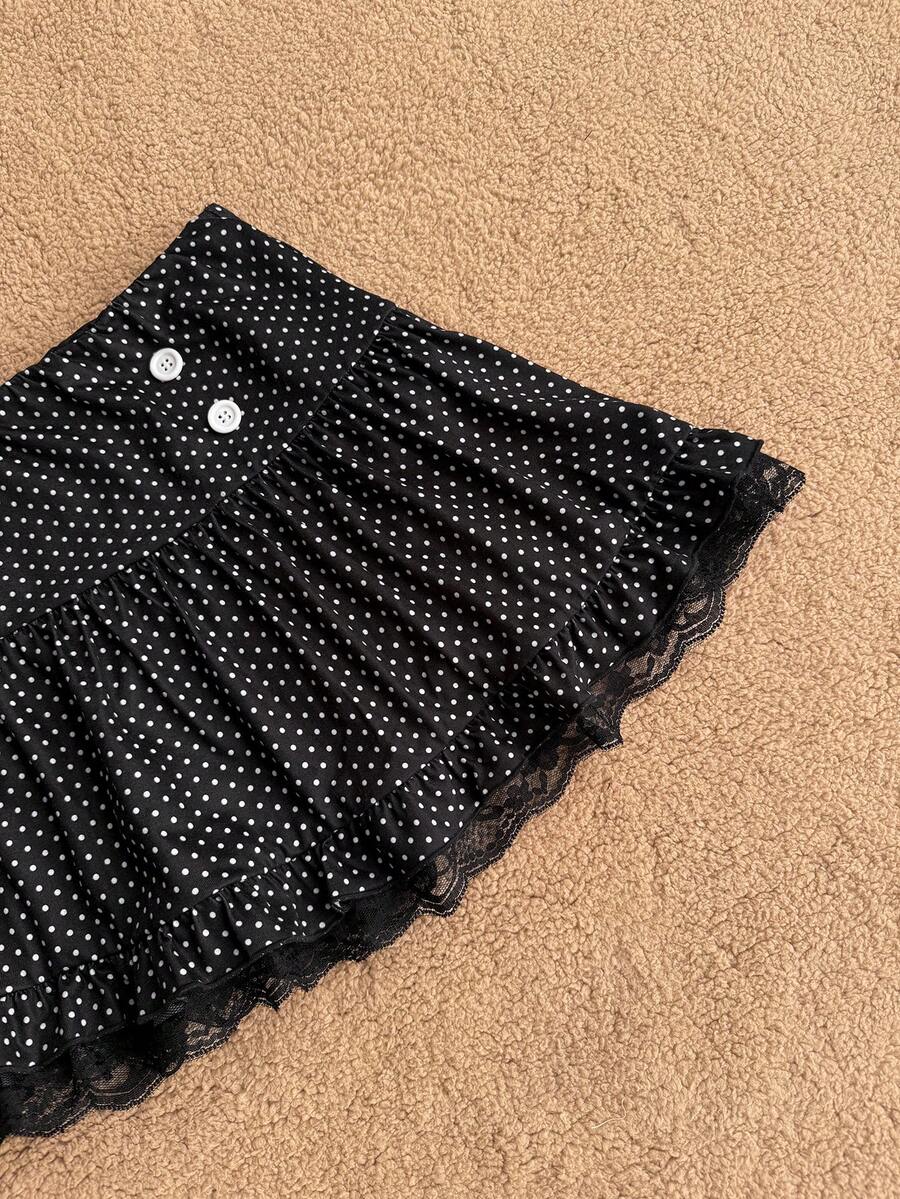 Women's plain black ultra low waist bodycon mini skirt with frill detailing in knitted stretch fabric.