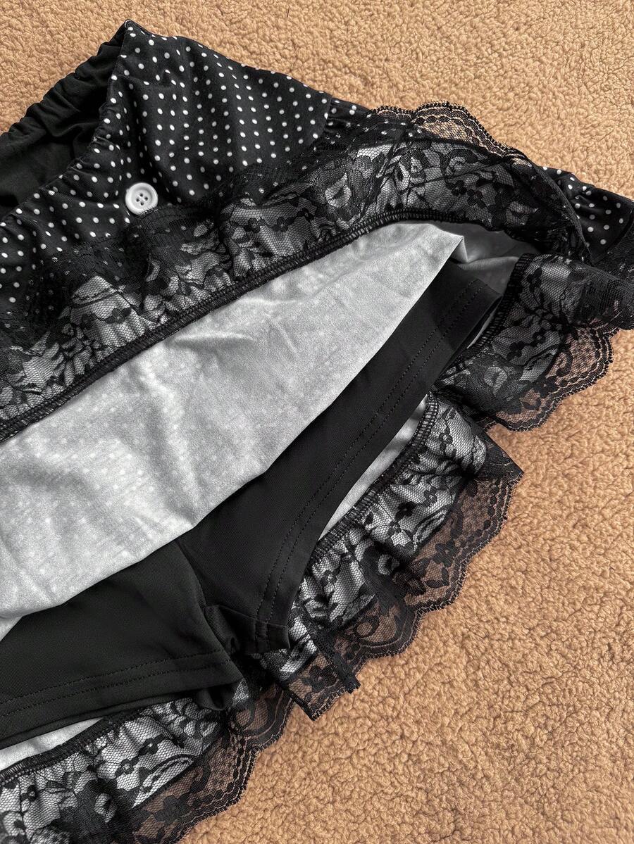Women's plain black ultra low waist bodycon mini skirt with frill detailing in knitted stretch fabric.
