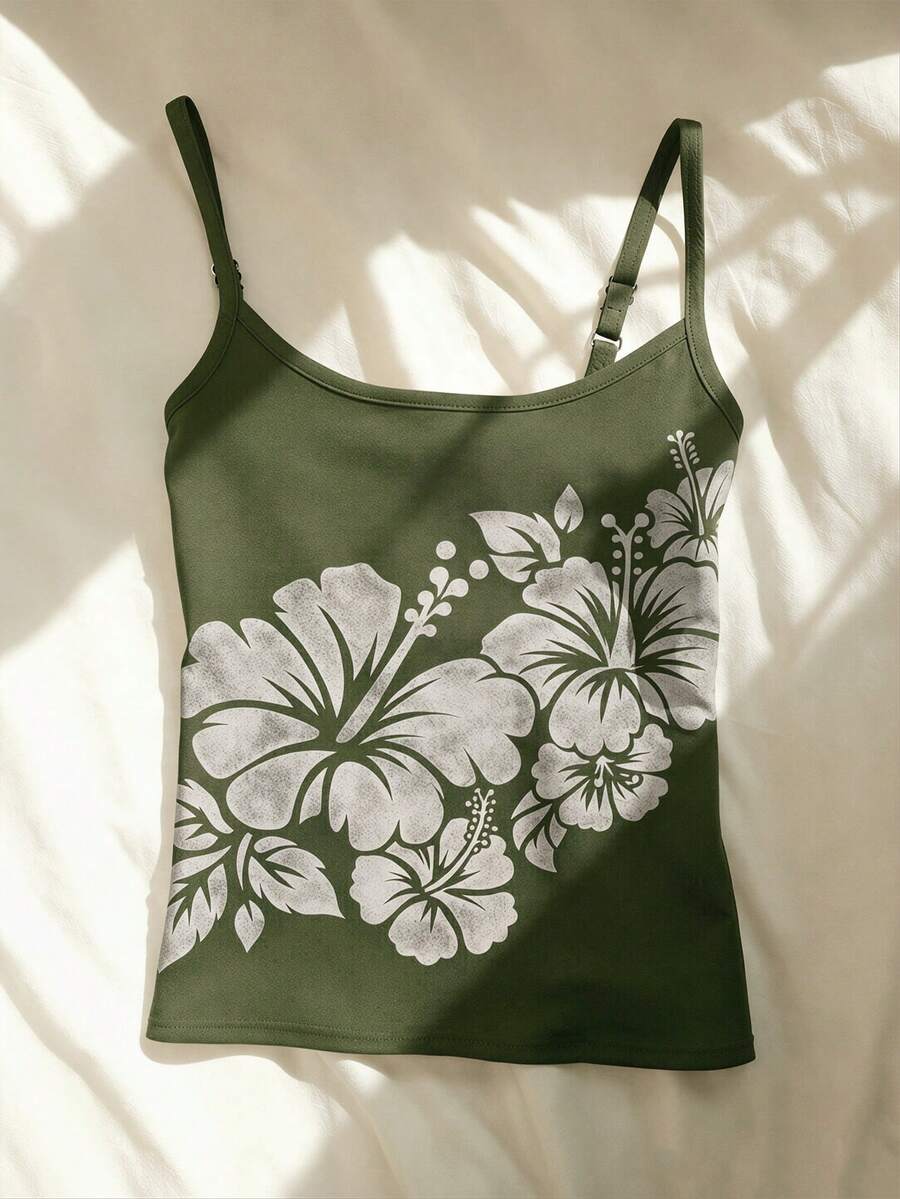 Women's blue floral print spaghetti strap camisole top in a slim fit short length design