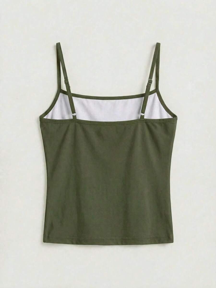 Women's blue floral print spaghetti strap camisole top in a slim fit short length design