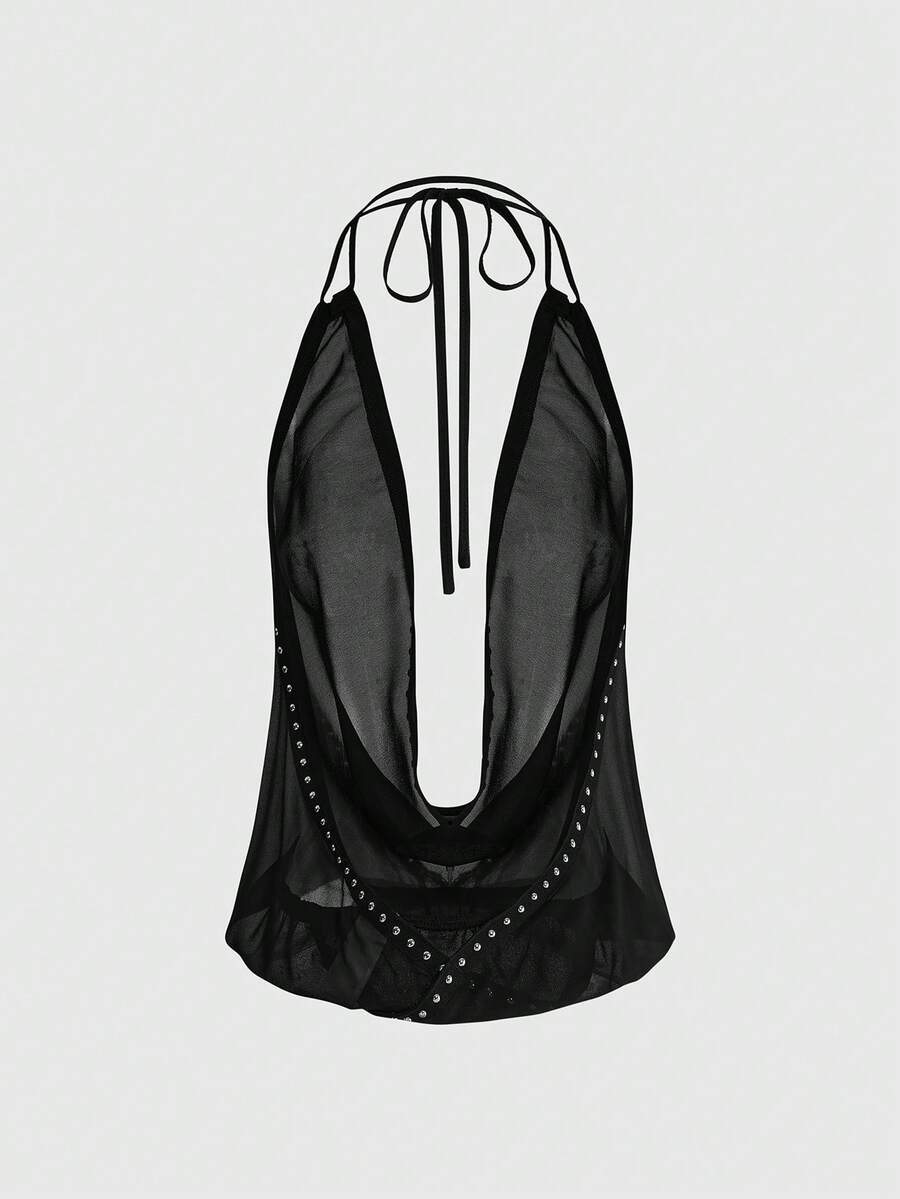 Women's black halter cowl backless crop top featuring asymmetrical draped hem and knot detail