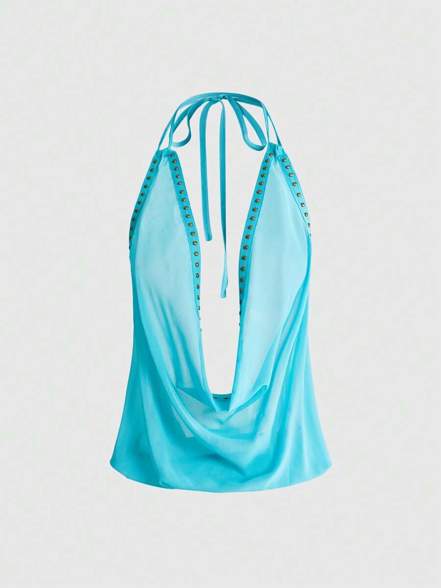 Women's black halter cowl backless crop top featuring asymmetrical draped hem and knot detail