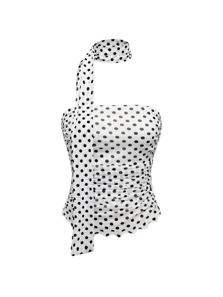 Women's black polka dot strapless tube top made of ruched mesh fabric featuring an asymmetrical hem and matching scarf.