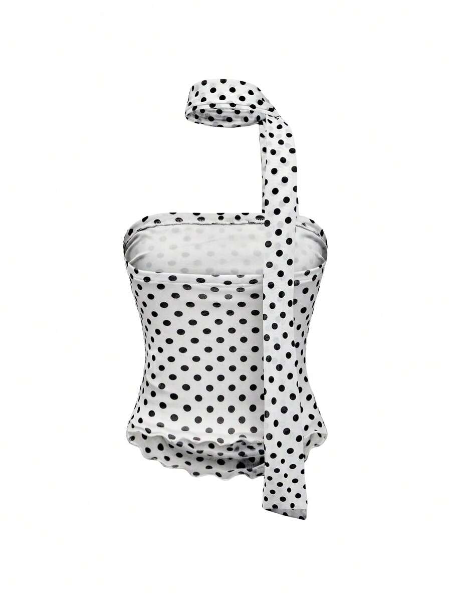 Women's black polka dot strapless tube top made of ruched mesh fabric featuring an asymmetrical hem and matching scarf.