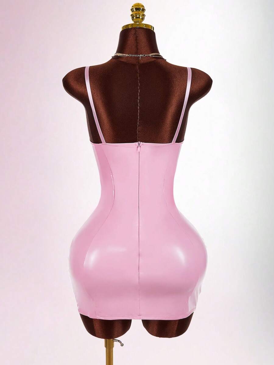 Women's sleeveless spaghetti strap mini bodycon dress featuring cup details, backless design, and zipper closure.