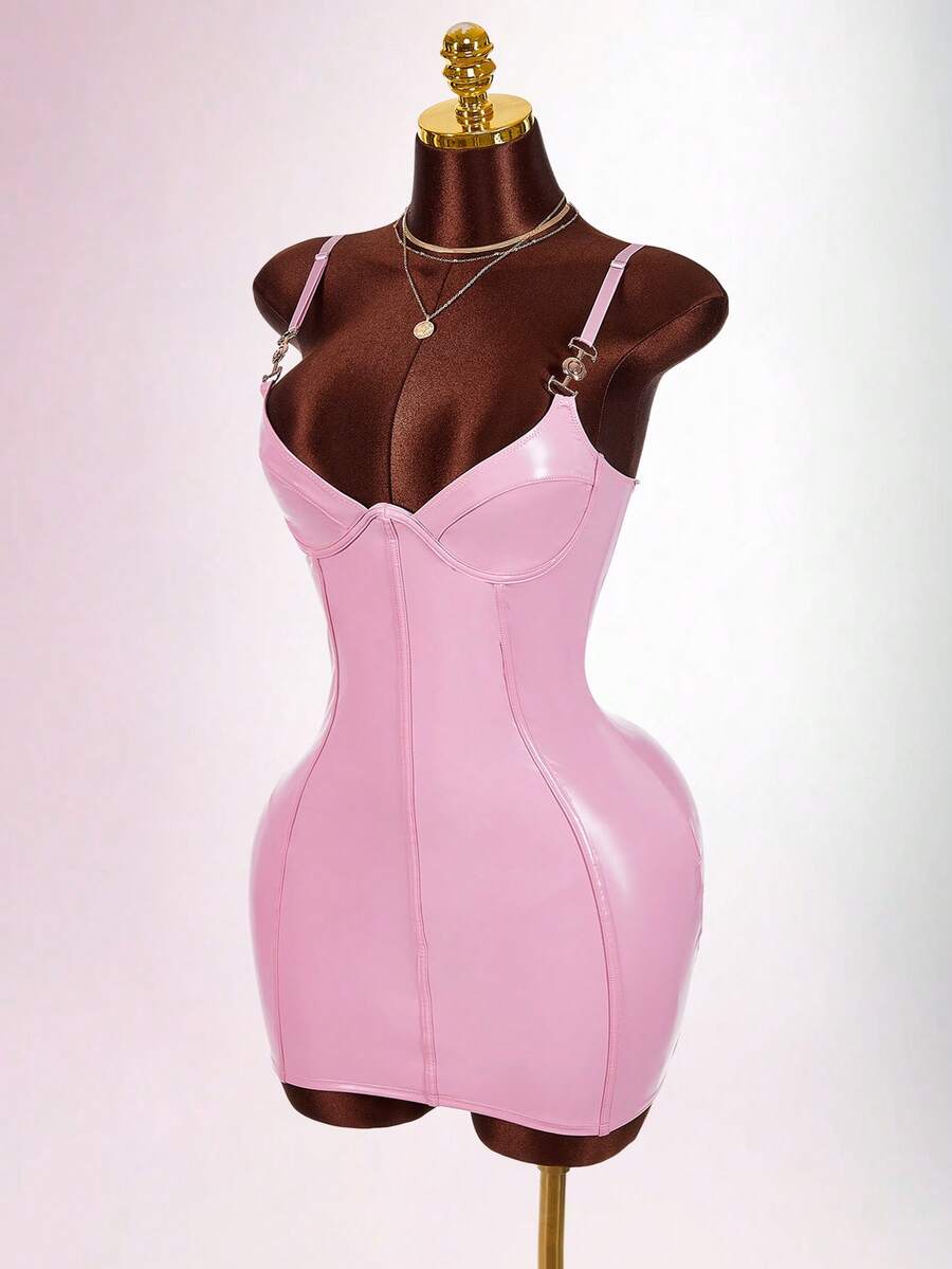 Women's sleeveless spaghetti strap mini bodycon dress featuring cup details, backless design, and zipper closure.