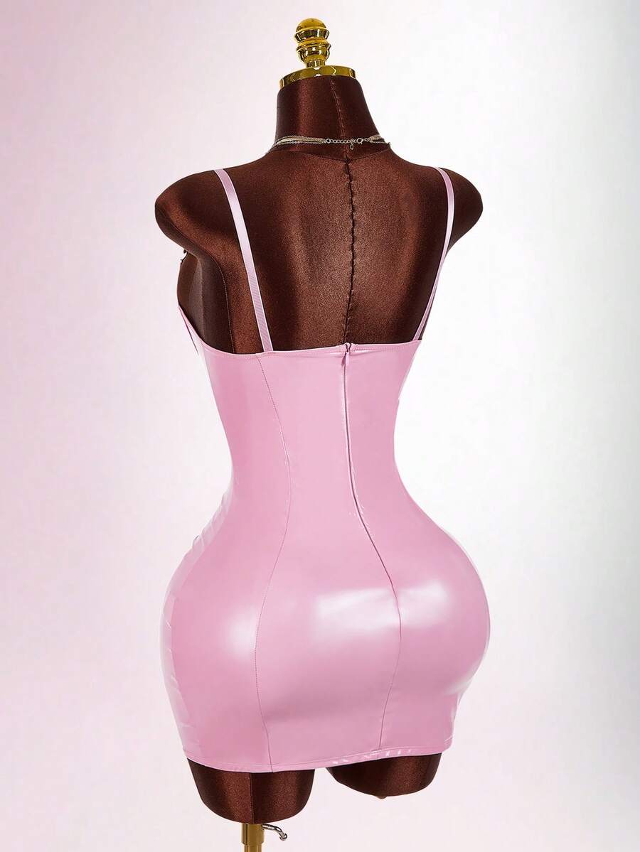 Women's sleeveless spaghetti strap mini bodycon dress featuring cup details, backless design, and zipper closure.