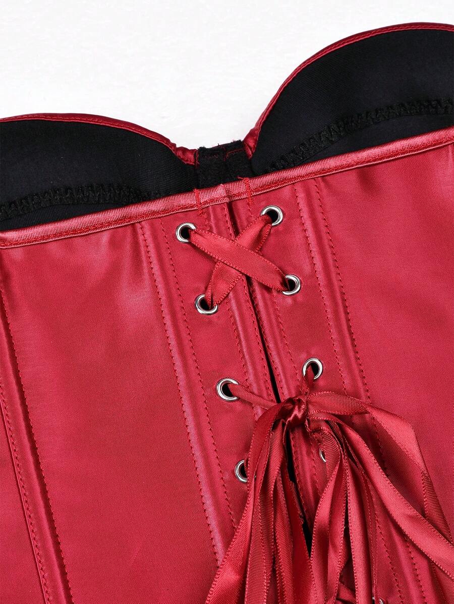 White women’s corset top with metal eyelet details, boning structure, spaghetti straps, backless tie-back design, and a slim cropped fit.