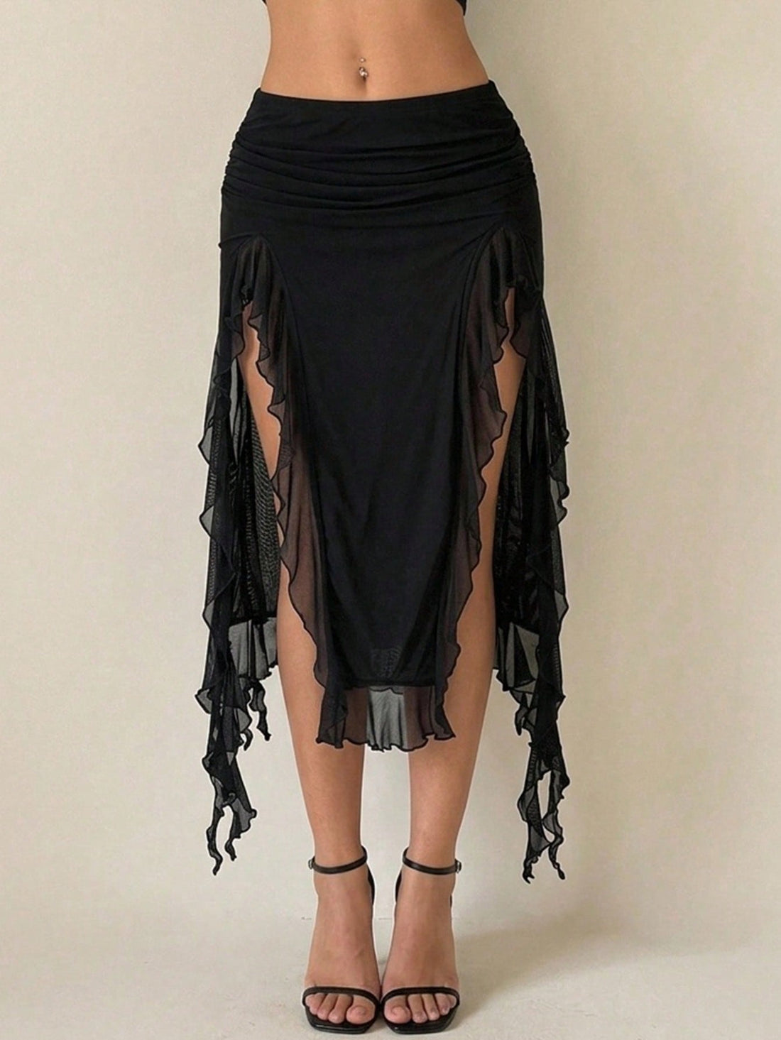 Women's black low rise asymmetrical midi skirt with ruched mesh fabric and layered ruffle hem