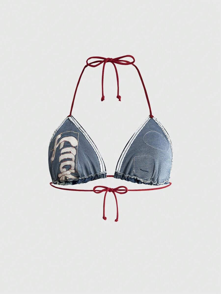 Blue denim sleeveless halter crop top for women featuring front knot tie detail and slim fit design.
