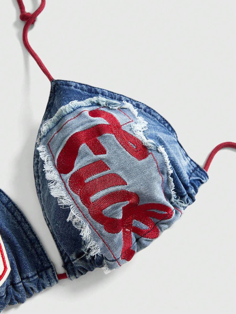 Blue denim sleeveless halter crop top for women featuring front knot tie detail and slim fit design.