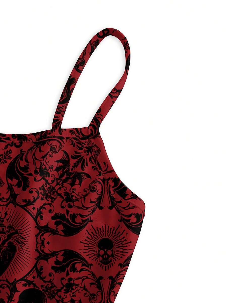Women wearing a black gothic skull print backless cami mini dress with spaghetti straps and lettuce trim hem.