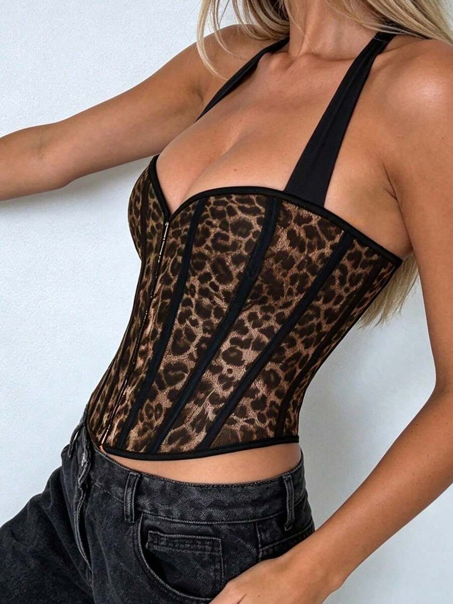 White Y2K halter backless corset top featuring lace-up back detail and metal grommet eyelets for women