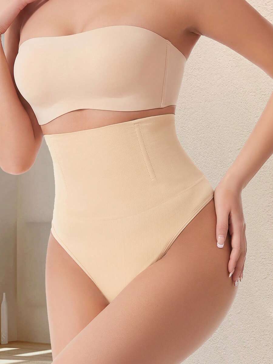 Apricot high waist seamless shaping panties for women displaying tummy control design.