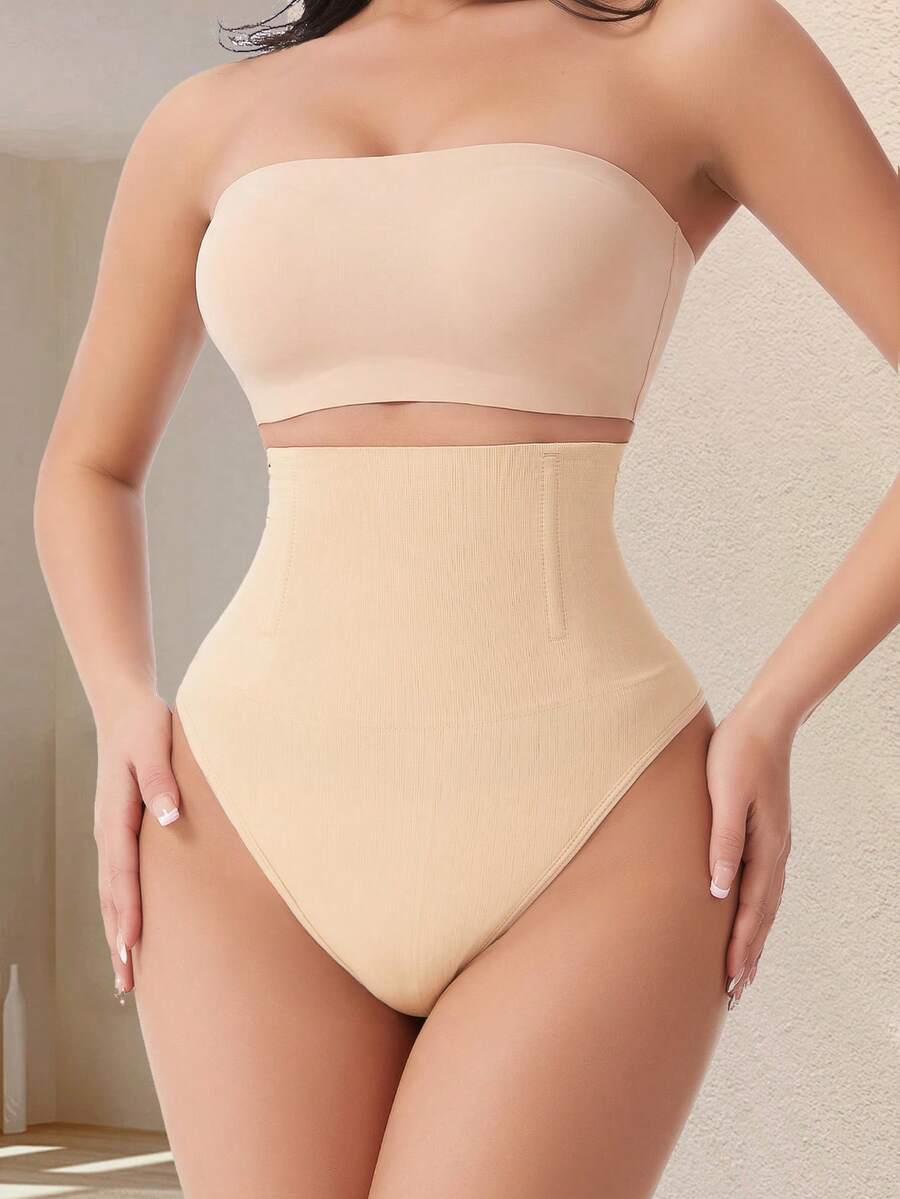 Apricot high waist seamless shaping panties for women displaying tummy control design.