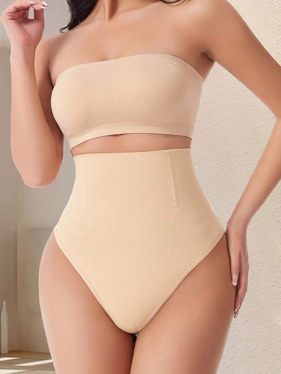 Apricot high waist seamless shaping panties for women displaying tummy control design.