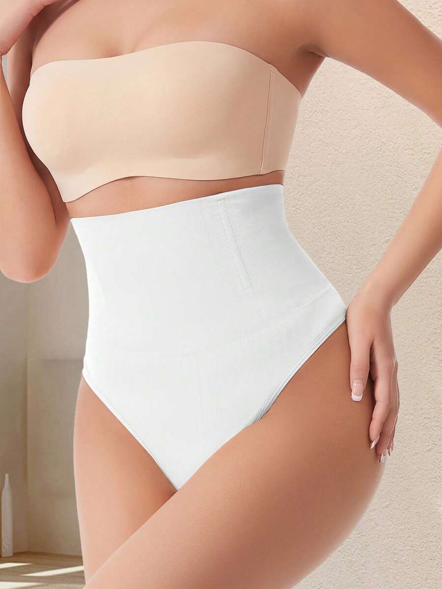 Apricot high waist seamless shaping panties for women displaying tummy control design.