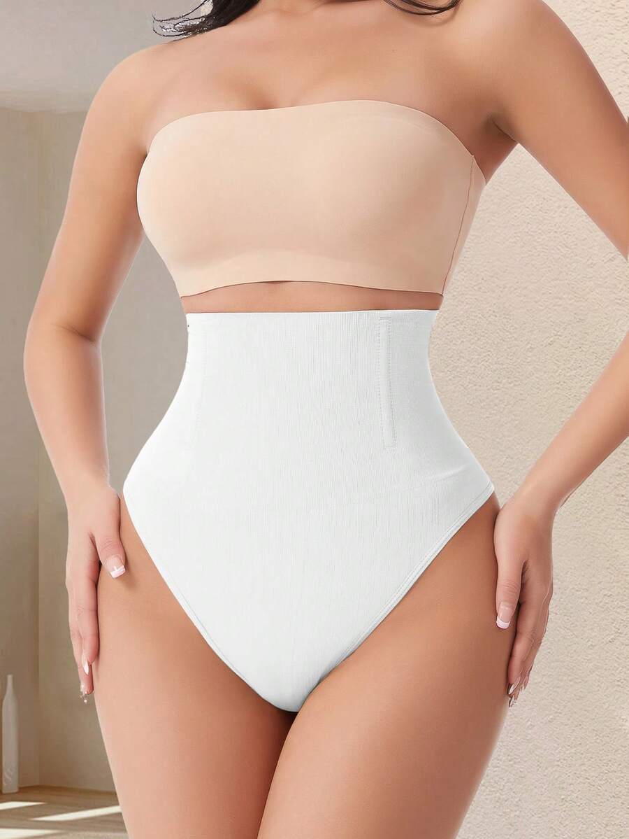 Apricot high waist seamless shaping panties for women displaying tummy control design.