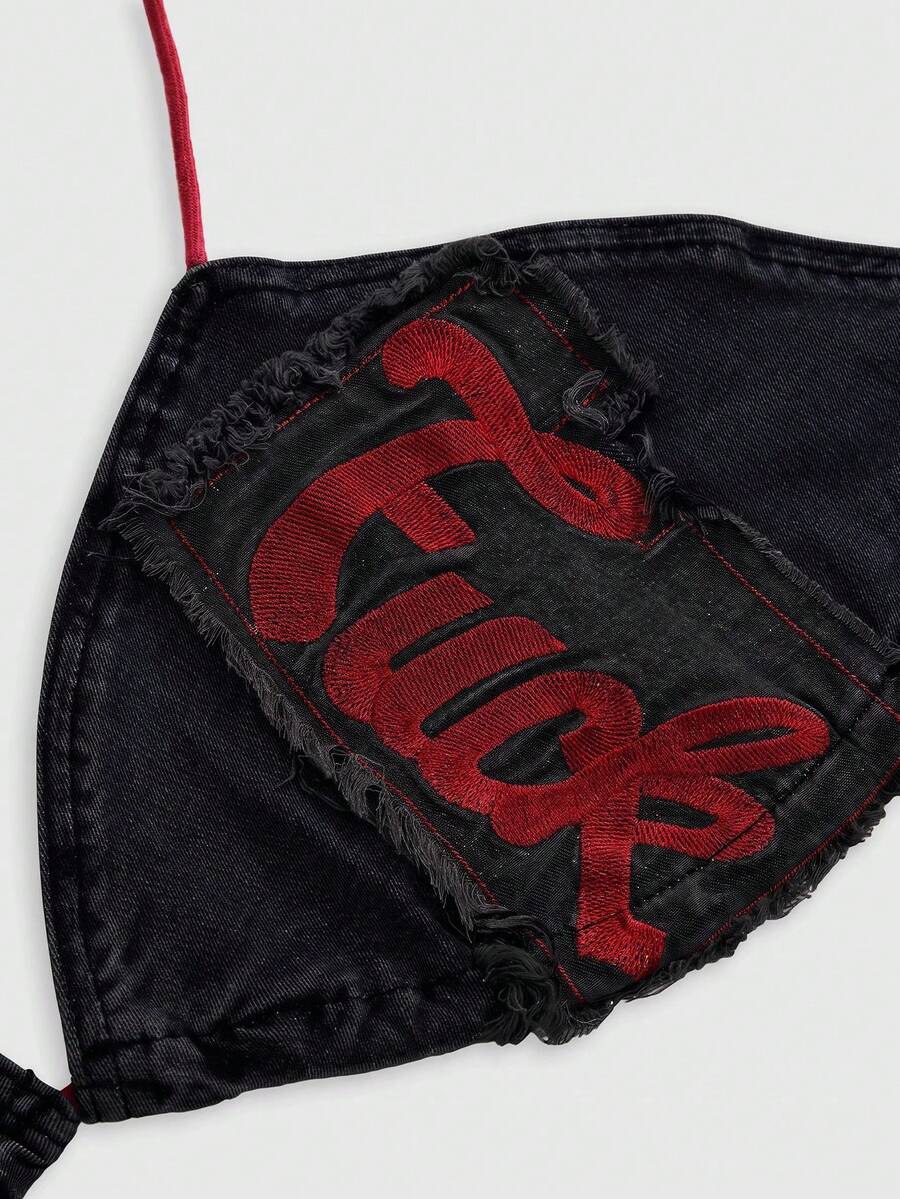Blue denim sleeveless halter crop top for women featuring front knot tie detail and slim fit design.