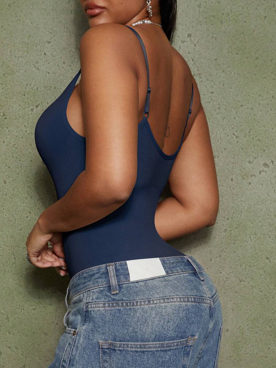 Brown seamless shapewear bodysuit featuring backless design, thong bottom, non-removable padding, and high-stretch fabric for tummy and waist control.