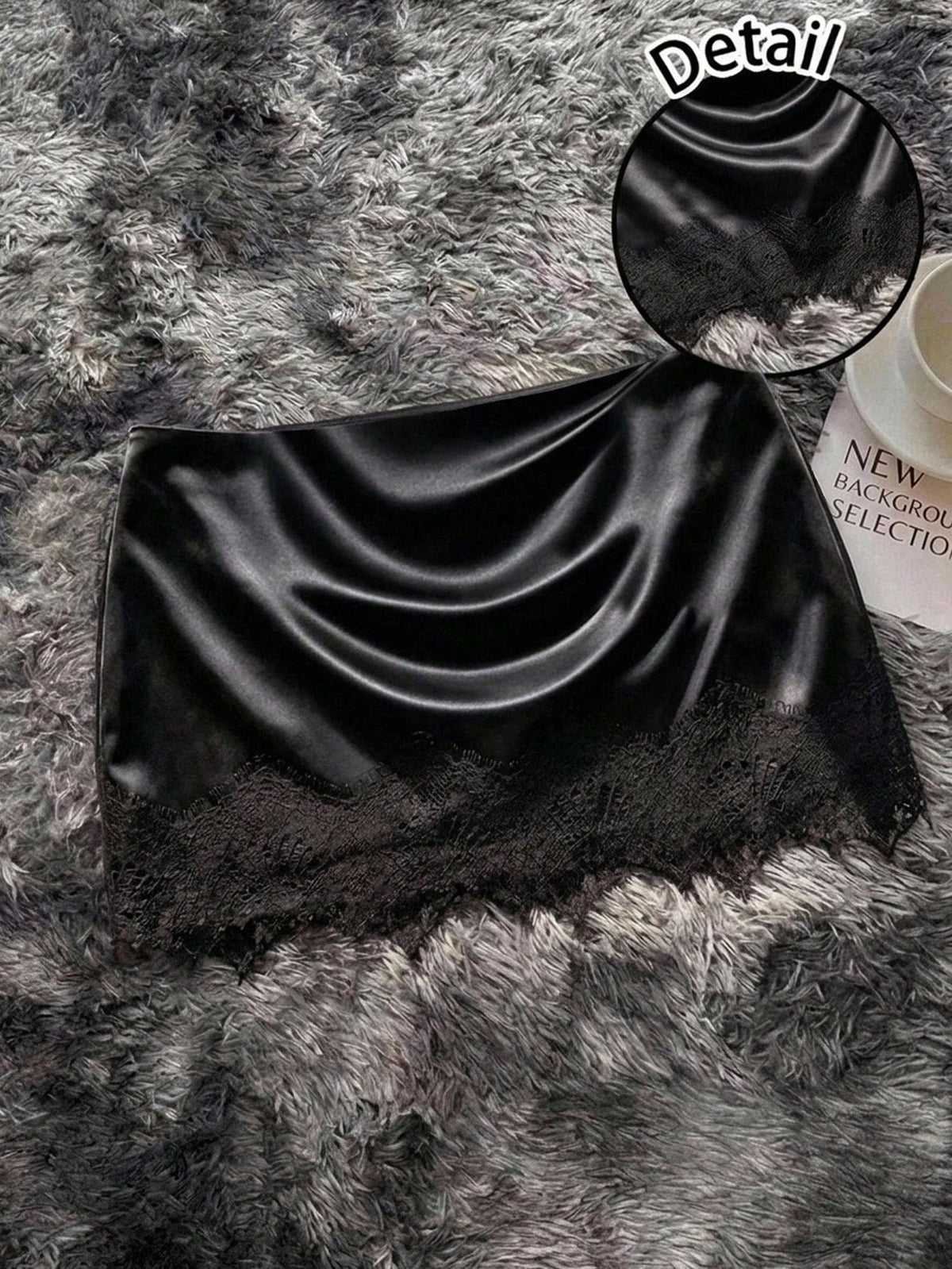 Women's low-waist black lace patchwork mini skirt with bodycon fit.