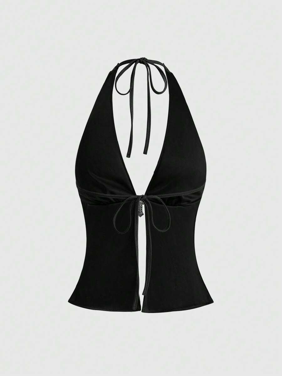 Women's sequin halter tank top featuring a backless slim fit design with knot and split details.