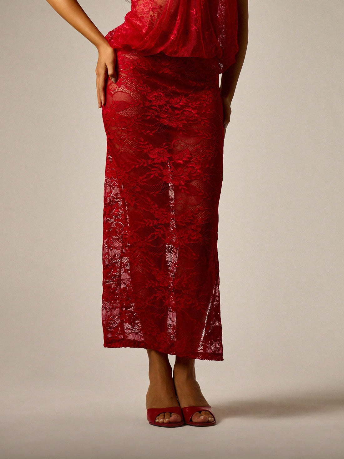 Red sheer floral lace pencil maxi skirt featuring a side split, mid waist fit, and high stretch unlined lace material for women.