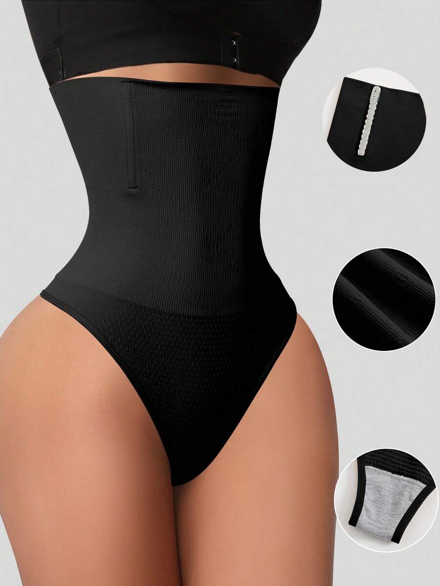 Black high waist seamless tummy control panties for women featuring high-stretch knitted fabric and contrast mesh details.