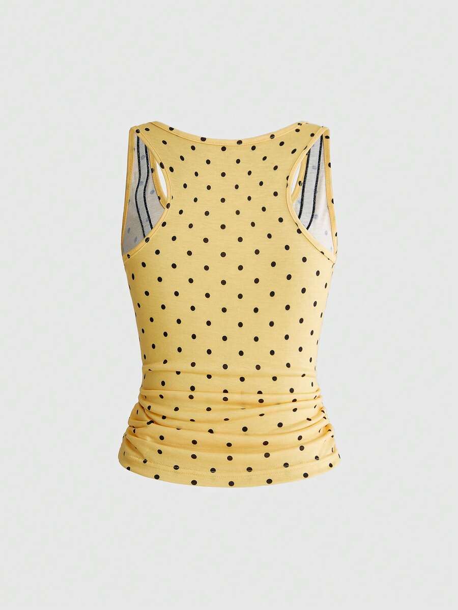 White slim fit square neck polka dot camisole top featuring cat and butterfly graphic print with studded arm sleeves.