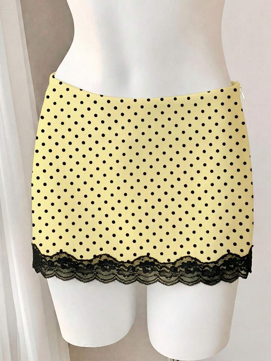 Women's white 100% cotton low waist mini skirt featuring a tropical print and zipper detail.