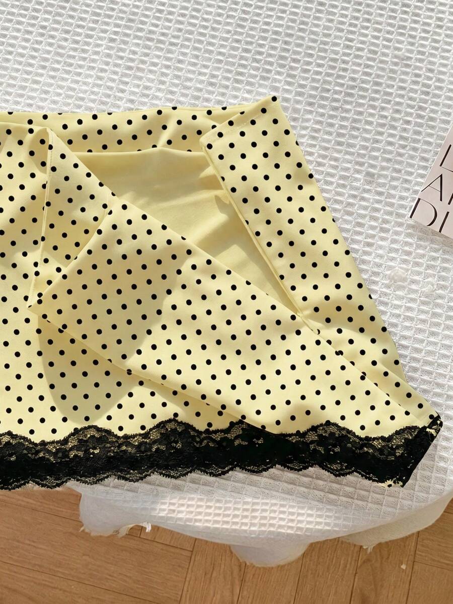 Women's white 100% cotton low waist mini skirt featuring a tropical print and zipper detail.