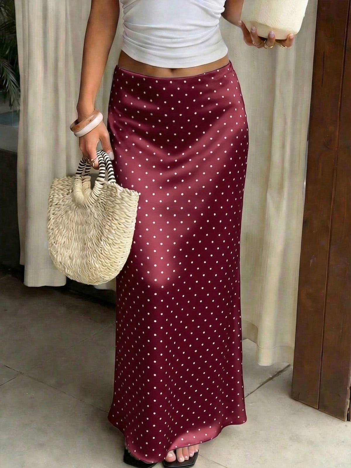 Women's white satin long dress featuring a high waist and elegant fishtail hem