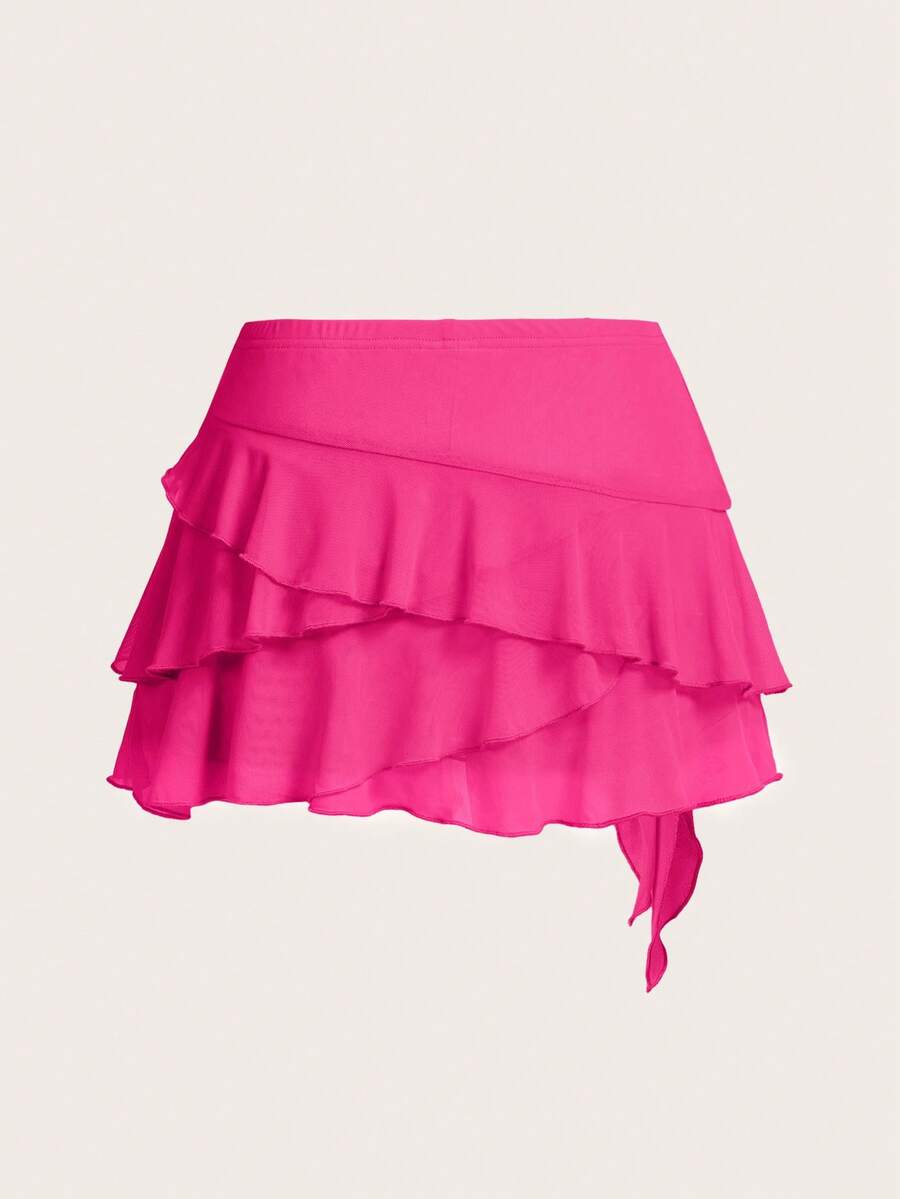 White tiered ruffle trim mini skirt for women with low waist, knot detail, mesh fabric, and casual Y2K boho design.