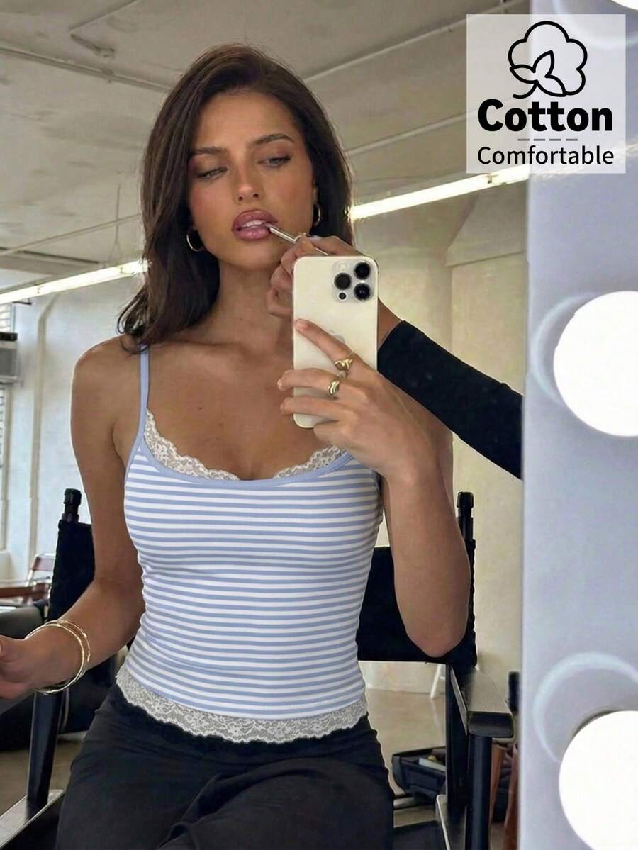 Women's blue and white striped camisole featuring white contrast lace patchwork, spaghetti straps, and a backless slim fit design.