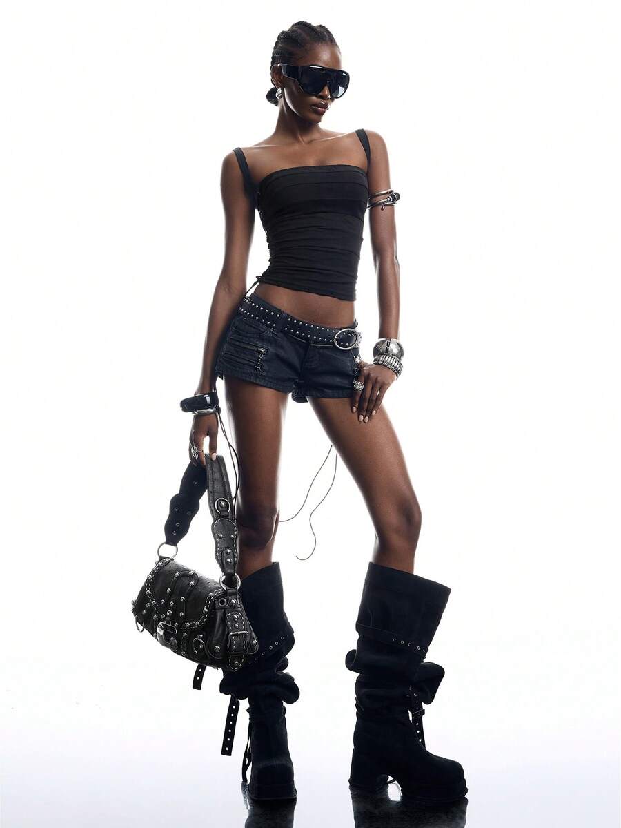 Black PU leather cropped camisole top for women featuring spaghetti straps, side tie details, and a ruched slim fit.