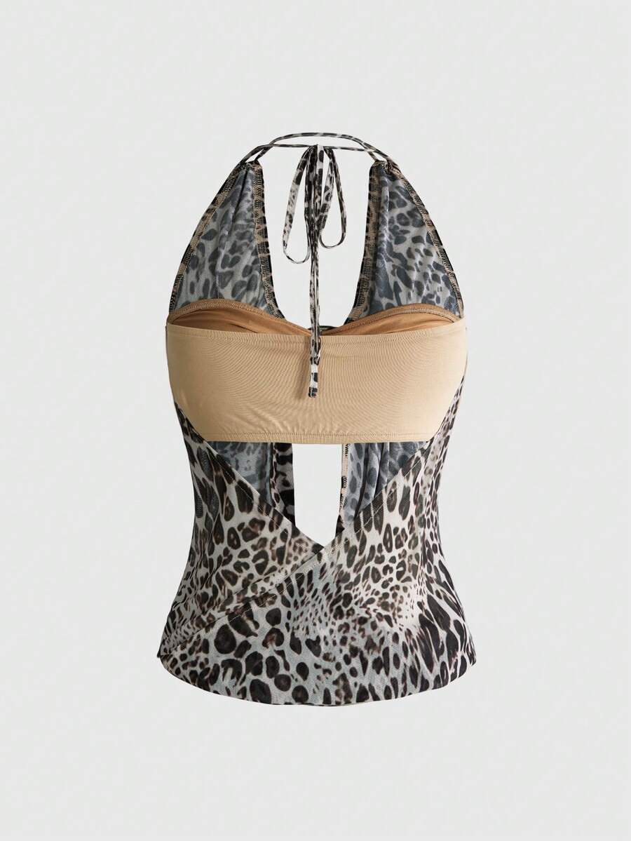 Women's cowl neck halter crop tank top featuring a draped backless design and matching bandeau inner layer.