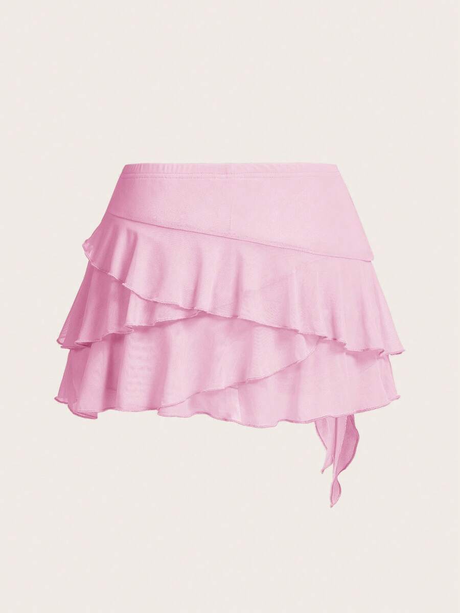 White tiered ruffle trim mini skirt for women with low waist, knot detail, mesh fabric, and casual Y2K boho design.