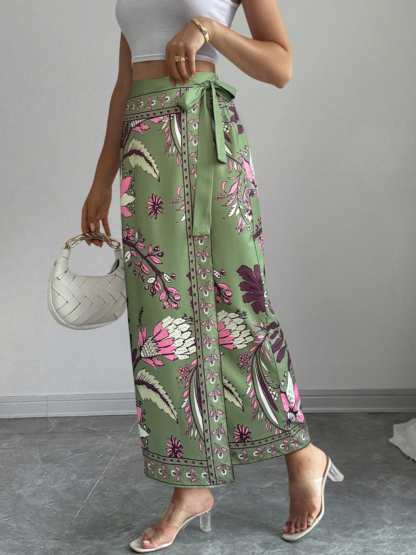 women's multicolor floral print wrap skirt featuring a high-waisted tie belt, A-line long silhouette, and boho woven fabric.