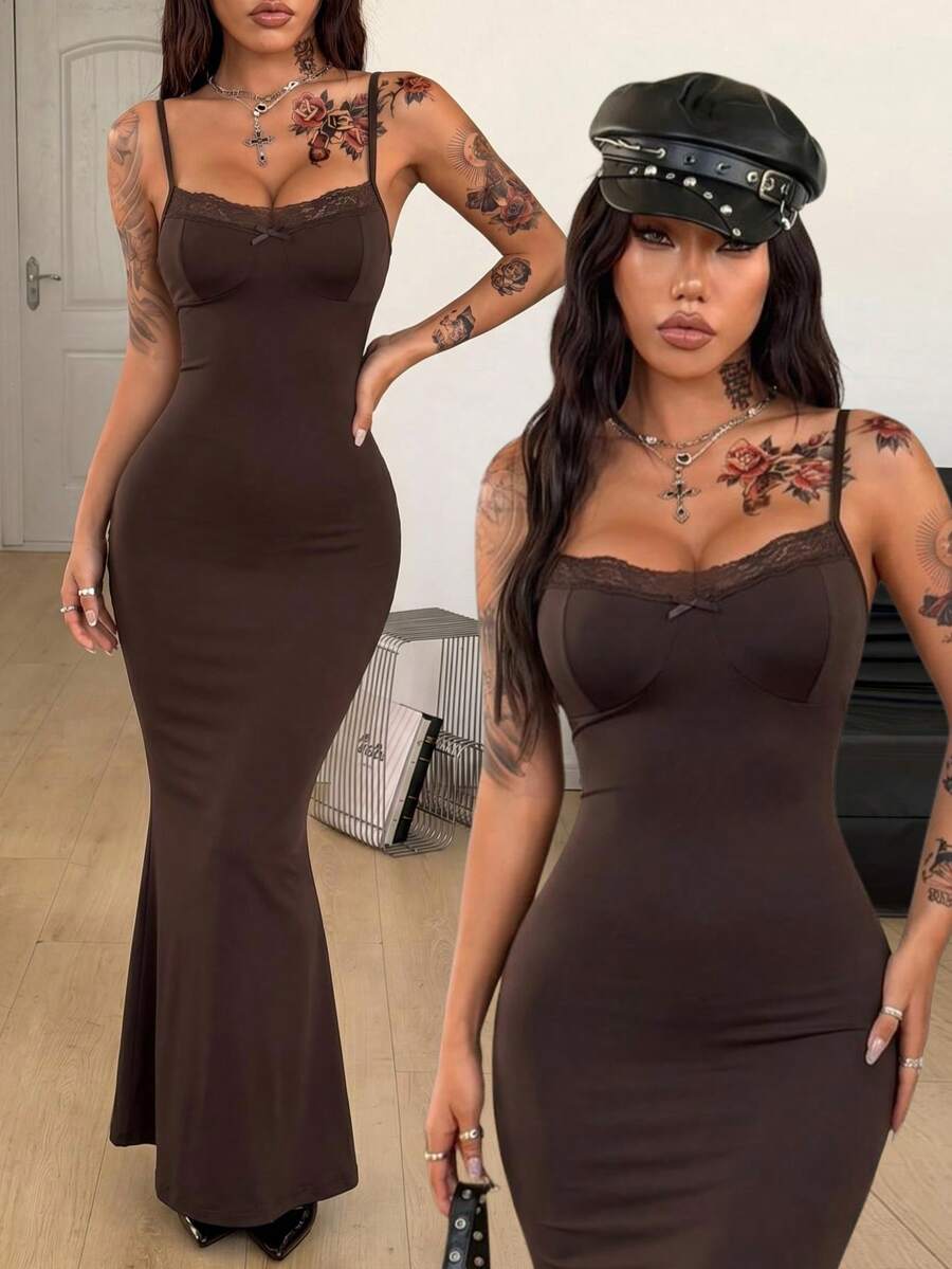 Black backless cami midi dress for women featuring spaghetti straps, slim fit mermaid silhouette, backless button detail, and high stretch knitted fabric.