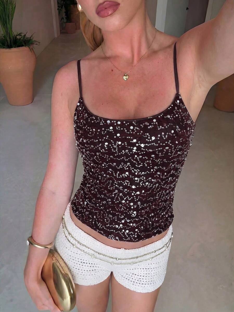 Women's sequin camisole top with spaghetti straps and a 3D rose embellishment