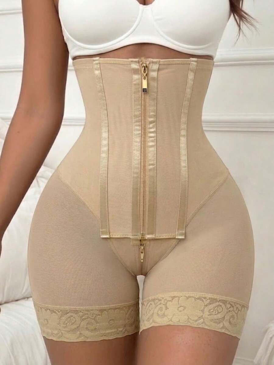 Women's high waist shaping shorts in apricot with zipper closure and tummy control features.