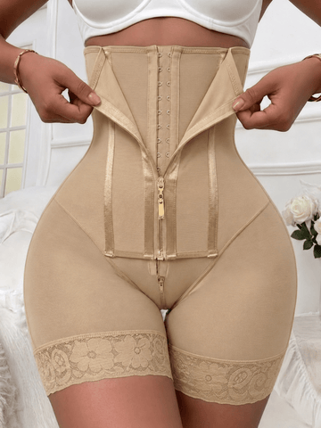 Women's high waist shaping shorts in apricot with zipper closure and tummy control features.