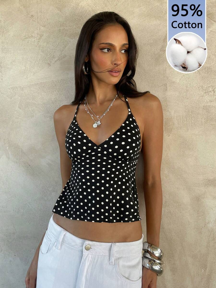 Women's black faux leather backless cami top with spaghetti straps and lace-up shirred sides.