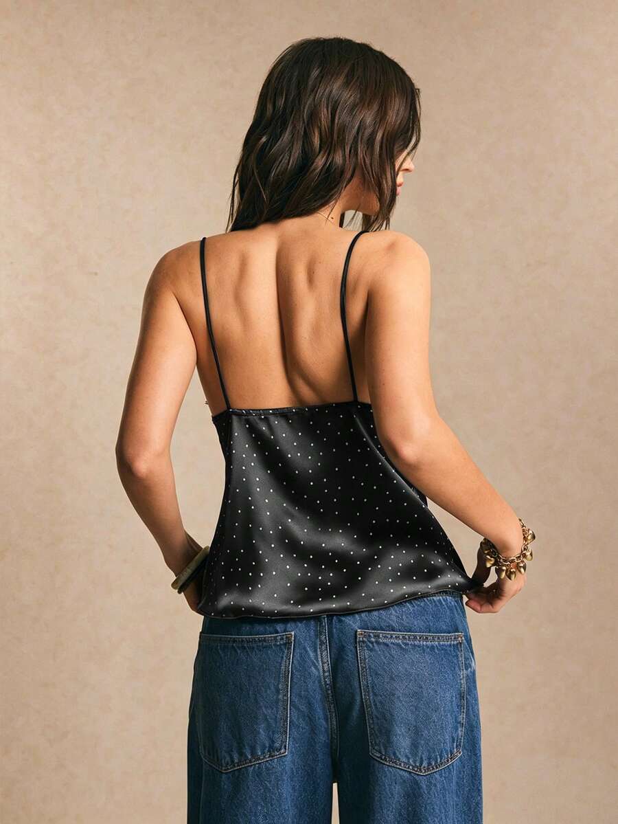 Women's polka dot lace patchwork pleated camisole top featuring an asymmetrical hem and spaghetti straps.